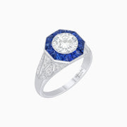Art Deco Inspired Round Cut Ring with Octagonal Calibré-Cut Gemstone Halo - Shahin Jewelry